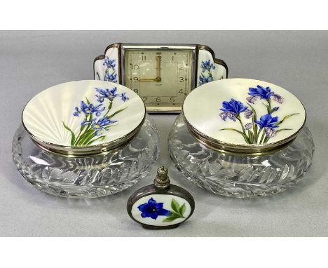 CIRCULAR CUT GLASS DRESSING TABLE JARS, A PAIR - with silver and cream guilloche enamel lids, with floral detail, Birmingham 