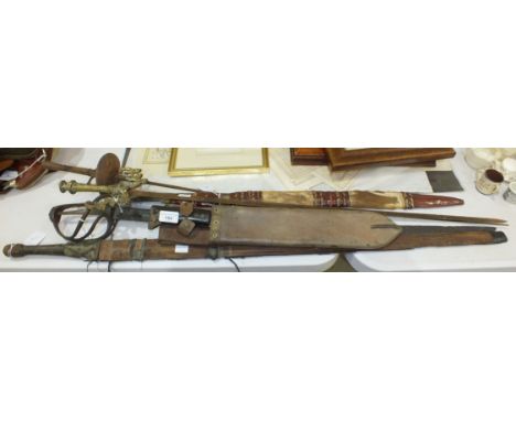 A machete with 37cm blade in scabbard, various swords, (all a/f) and a small collection of wooden woodworking planes. 