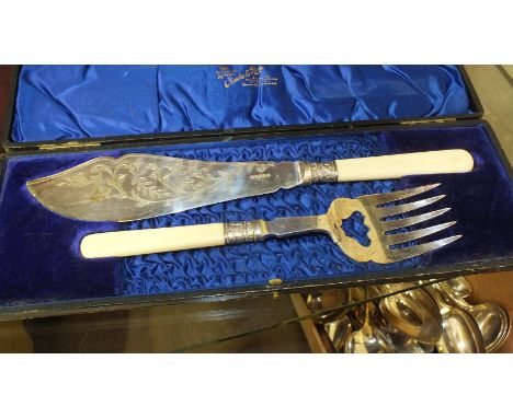 A cased set of plated fish servers, other plated cutlery, a decorated ceramic egg, 7cm high and miscellaneous items. 