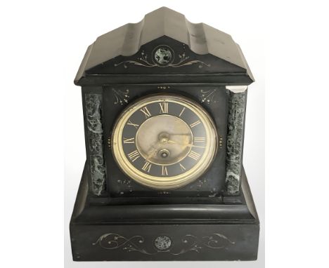 A Victorian black slate and marble eight day mantle clock, with two keys, no pendulum, height 26 cm.