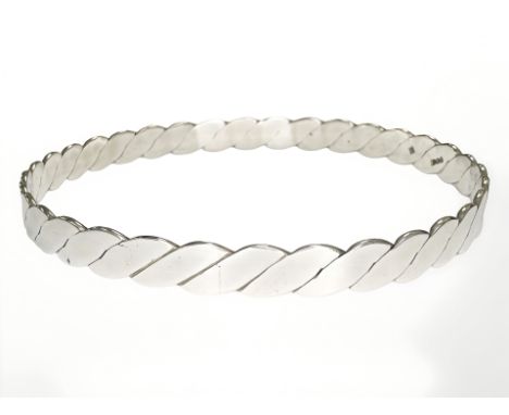 A silver bangle, London 1973, diameter 68 mm. CONDITION REPORT: 14.8g.