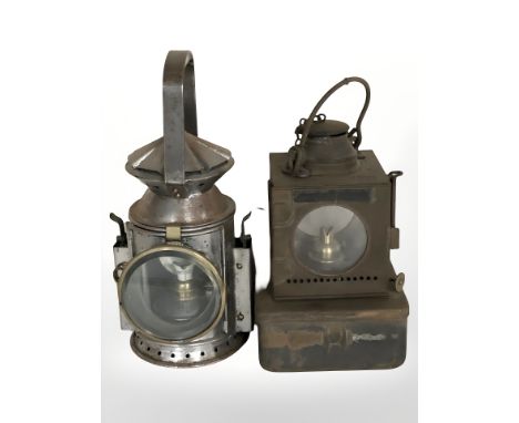 A Wakefield's Birmingham signalling lamp, stamped 1944, with War Department broad arrow, height 31 cm, and an LNER railway la