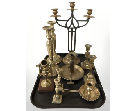 A brass candelabrum, three pairs of candlesticks, binnacle candlestick, etc.