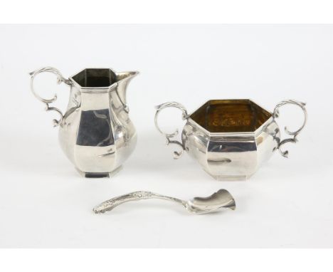 Hexagonal silver cream jug and matching sugar bowl by Garrard & Co. Ltd, London 1962 together with a French silver caddy spoo