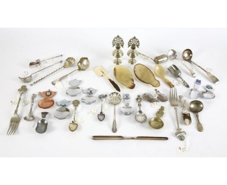 A quantity of small silver items to include caddy spoons together with a selection of continental silver and white metal silv