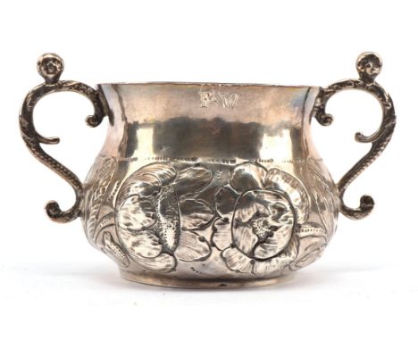 Charles II Restoration period silver porringer the circular bellied form with chased foliage and flower decoration, inscribed