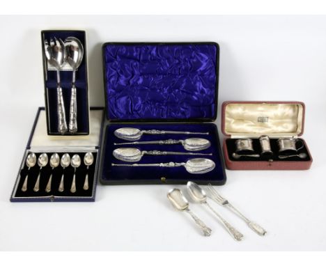 Cased set of four Edward VII anointing spoons by William Hutton & Sons Ltd, London 1902, three piece cruet set with two spoon