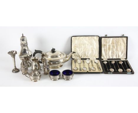 Compressed oval silver tea pot, sugar castor with weighted base, (top unmarked), cream jug, five piece condiment set, small t