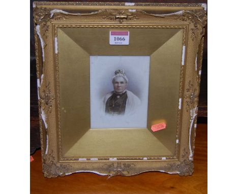 A Victorian portrait photographic print on opaque porcelain, 13 x 10cm, in glazed frame