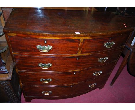 A 19th century mahogany bowfront chest of drawers, width 105cmCondition report: Horizontal split in top, various areas of ven