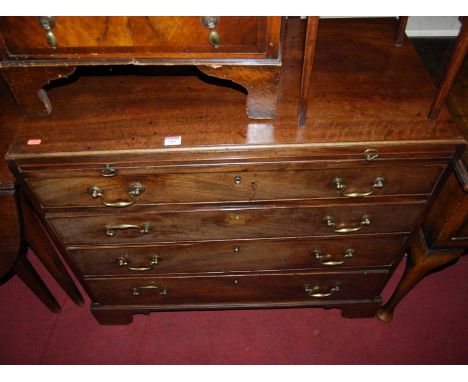 An early 19th century mahogany chest of four long graduated drawers, with upper brushing slide, width 94cm