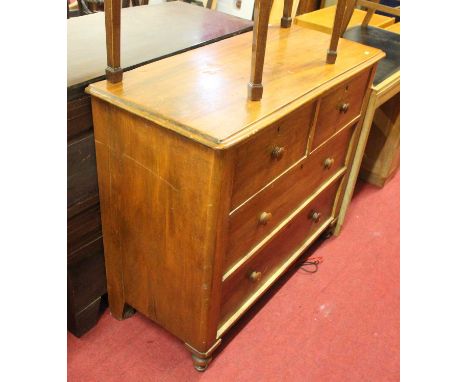 A Victorian mahogany chest, containing two short over two long drawers, on turned feet, w.107cm