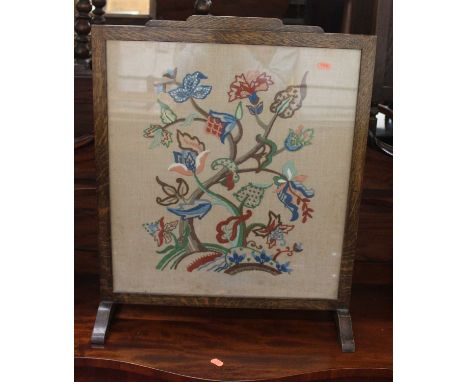 A 1930s tapestry embroidered inset fire screen, w.56.5cm