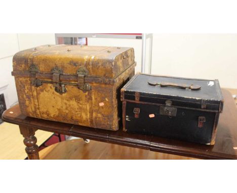 A stained tin trunk, w.61cm; together with a leather case (2)