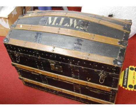 A 19th century wooden bound fitted canvas trunk