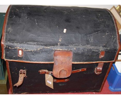 A canvas dome-topped trunk, with leather trim, w.70cm