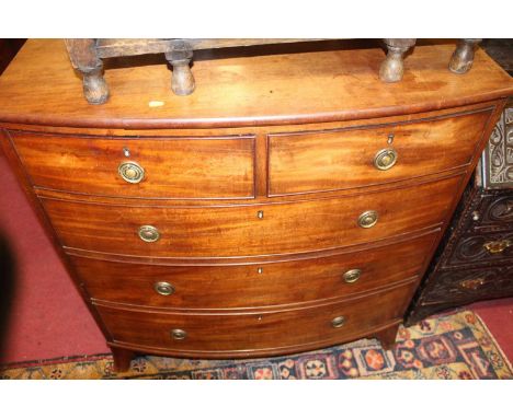 A Regency mahogany bowfront chest of drawers, on splayed bracket feet, width 104cm