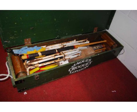 A Jaques of London boxed croquet set, as retailed by Harrod'sCondition report: Comprising four balls, four mallets, 6 large h