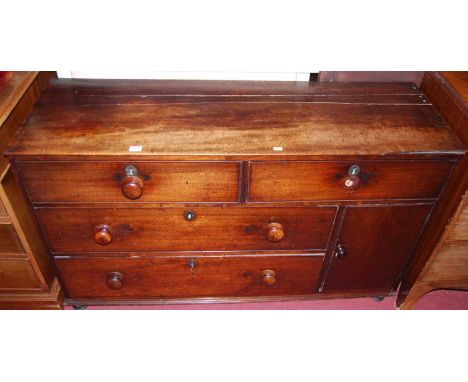 A 19th century provincial mahogany low sideboard, fitted with four drawers and single cupboard door, width 125cm