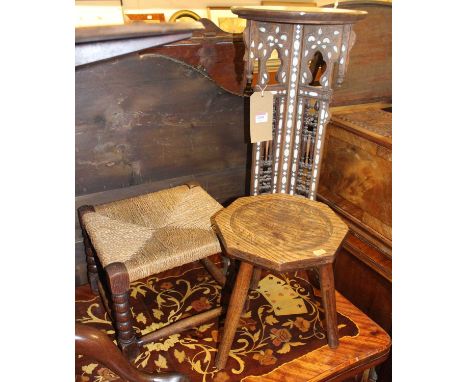 An occasional table, having a circular beech top on a mother of pearl inlaid base, together with an oak bobbin turned stool a