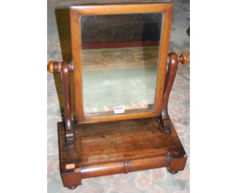 A Victorian mahogany swing toilet mirror, having two drawer boxbase