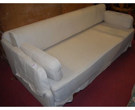 A contemporary upholstered three-seater sofa-bed, having pull-out lower section, w.195cm 