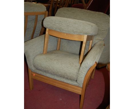 A pair of contemporary Ercol blond elm slatback and green upholstered armchairs, with single foot stool (3)