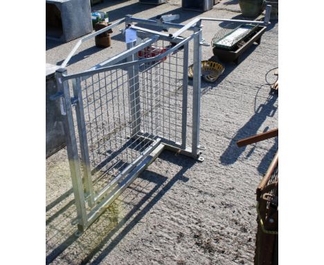 A sheep shearing pen gate. H107cm x W121cm x D70cmAll items in this auction are sold as seen, We are unable to provide condit