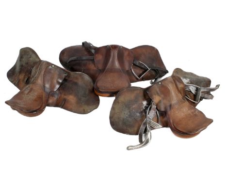 Three vintage brown leather horse riding saddles. Saddle badge-cantle measurements, L45cm, L44cm & L45cmAll items in this auc