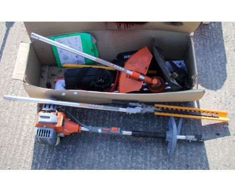 An Eskde petrol 4-in-1 garden multi-tool set. Model SKU MT52-S, in the original box with the instructions and safety equipmen