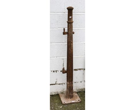 An iron gate post. Of tapering fluted form, with two fixing rods, on a square base. H145cm. All items in this auction are sol