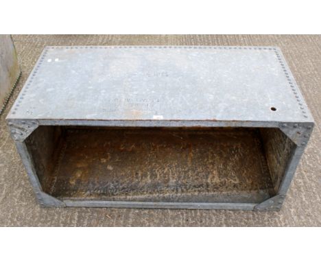 A galvanized and riveted metal trough. Marked 'Grade B 72 Gall actual ROWAN Co.' H60cm x W59cm x D122cm.All items in this auc