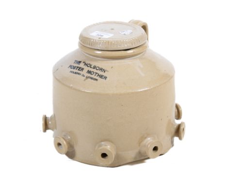 A vintage stoneware 'Holborn Foster Mother' feeder. With screw on cover and a pulled applied handle. H21cmAll items in this a