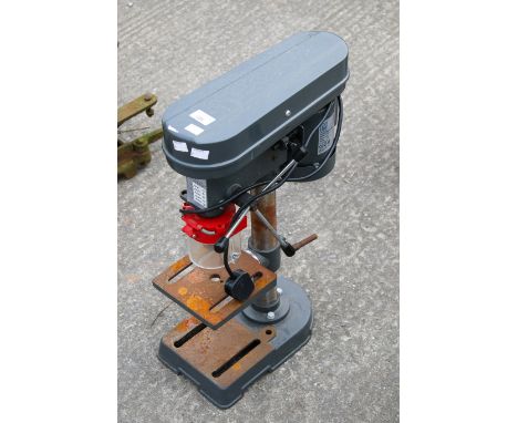 A bench drill. Model No FMTC350WBD 230v 50hz. H59cmAll items in this auction are sold as seen, We are unable to provide condi