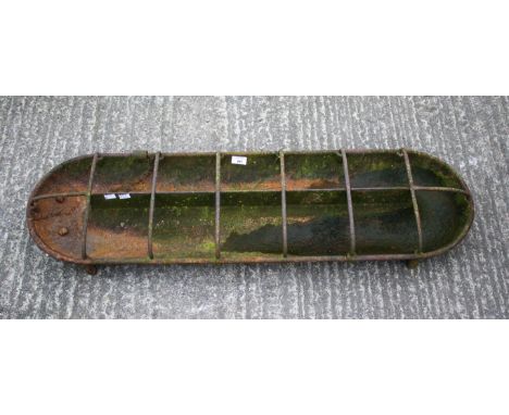 A Victorian cast metal feeding trough. L108cmAll items in this auction are sold as seen, We are unable to provide condition r