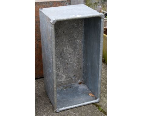 A galvanised trough. H40cm x W93cm x D46cmAll items in this auction are sold as seen, We are unable to provide condition repo