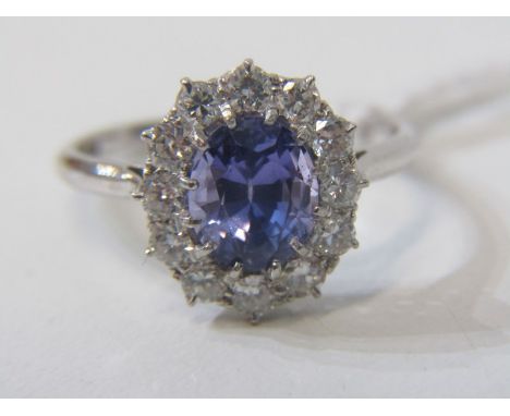 PLATINUM SAPPHIRE AND DIAMOND CLUSTER RING, beautiful purple sapphire surrounded by brilliant cut diamonds totalling approxim