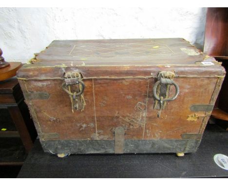 ANTIQUE LEATHER CASED TRUNK with original metal strapwork (requires restoration), 61cm width 