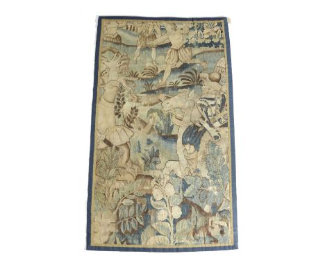 A TAPESTRY FRAGMENTFLEMISH, 17TH CENTURYworked in wool and silk, depicting a hunting scene with a mounted huntsman and figure