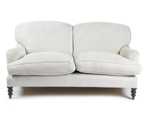 A PAIR OF SOFAS IN HOWARD STYLEPOSSIBLY BY GEORGE SMITH, LATE 20TH CENTURYeach on ring turned front legs (2)76cm high, 174cm 