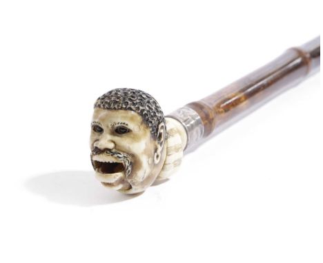 λ A NOVELTY MARINE IVORY AND BAMBOO WALKING STICKLATE 19TH / EARLY 20TH CENTURYcarved as a male blackamoor's head with button