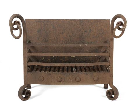 AN IRON FIREGRATEIN 17TH CENTURY STYLEwith scroll and ring front supports56cm high, 69.2cm wide, 35.5cm deep ProvenanceA priv
