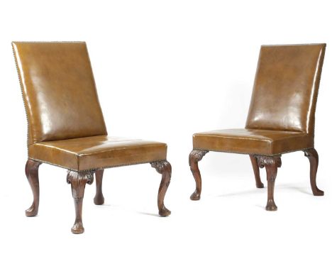 A PAIR OF GEORGE II RED WALNUT SIDE CHAIRSMID-18TH CENTURYeach with a padded back and seat later covered in studded brown lea