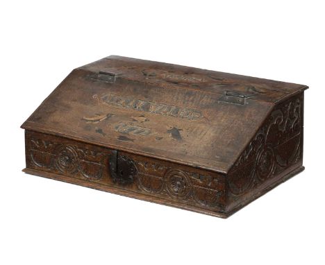  AN OAK AND INLAID BIBLE BOXDATED '1672'the top and cover carved 'FLYES' and 'IZAAK WALTON / 1672' surrounded by inlaid fish 