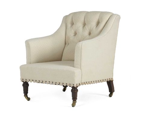 A LATE-VICTORIAN WALNUT EASY ARMCHAIRLATE 19TH CENTURYwith button upholstery on turned front legs and brass castorsProvenance