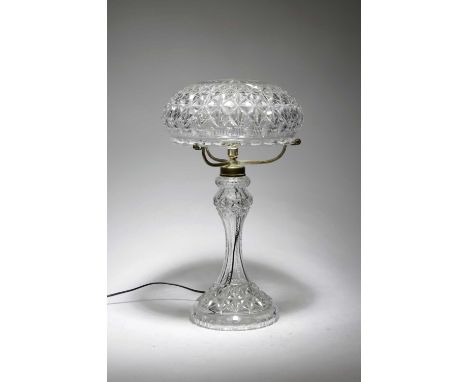 A GLASS TABLE LAMP AND SHADE20TH CENTURYwith bands of star and rondel decoration54.5cm high 