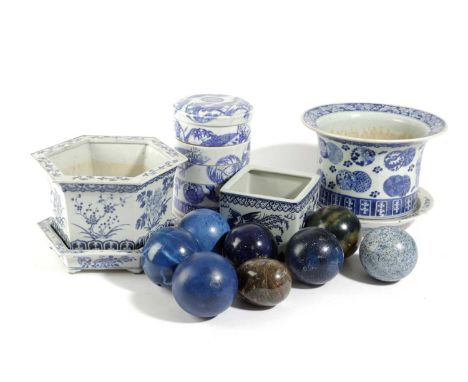 THREE CHINESE BLUE AND WHITE JARDINIÈRES19TH CENTURY AND LATERone of hexagonal form with a stand, one painted with dragons an