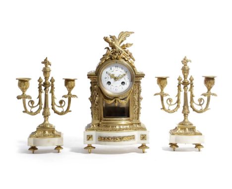 A FRENCH ORMOLU AND WHITE MARBLE CLOCK GARNITUREIN LOUIS XVI STYLE, LATE 19TH CENTURYthe brass eight day movement with an out