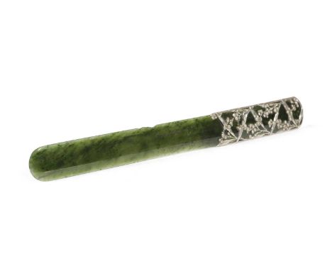 A NEPHRITE JADE AND SILVER MOUNTED PAGE TURNERBY BOUCHERON, PARISthe handle with mimosa flowering foliage and signed 'F. Bouc
