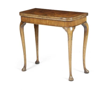 A WALNUT CARD TABLE IN GEORGE I STYLEBY W. CHARLES TOZER, EARLY 20TH CENTURYthe interior with a needlework playing surface de